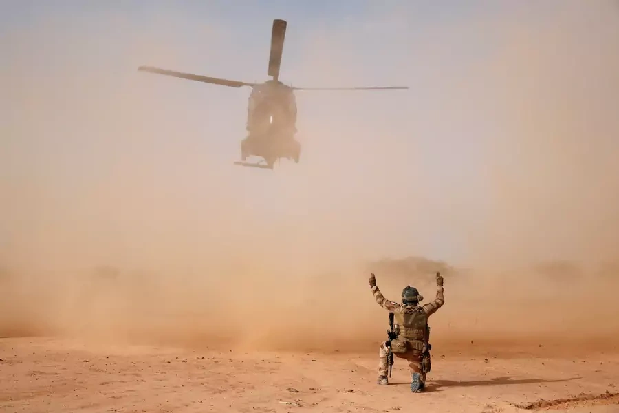An NH90 Caiman military helicopter lands next to a temporary forward operating base during Operation Barkhane in Ndaki, Mali, on July 29, 2019.