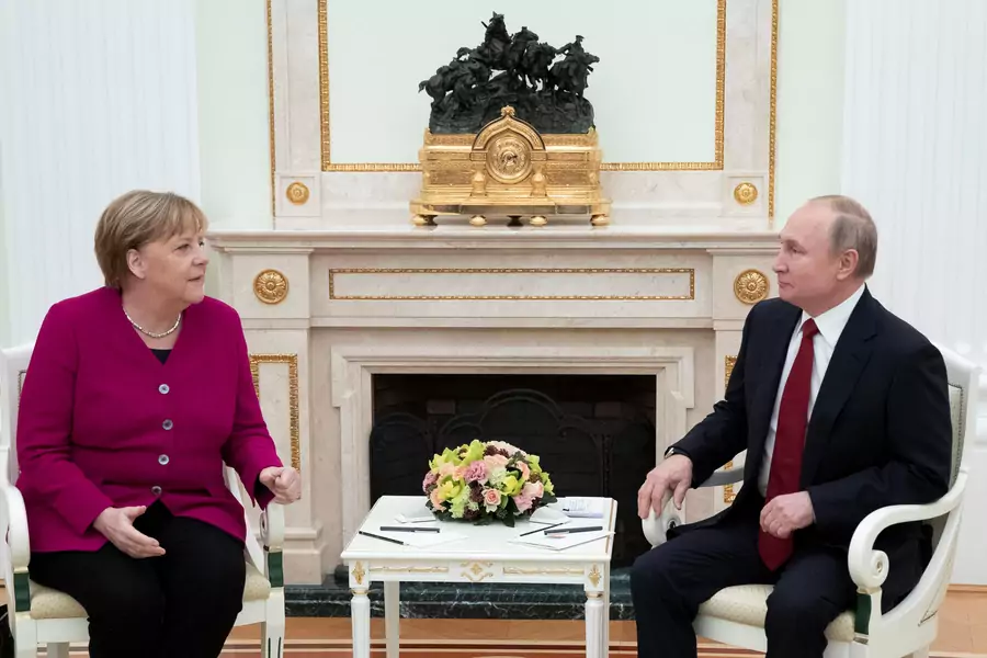 German Chancellor Angela Merkel gestures during the talks with Russian President Vladimir Putin in the Kremlin.