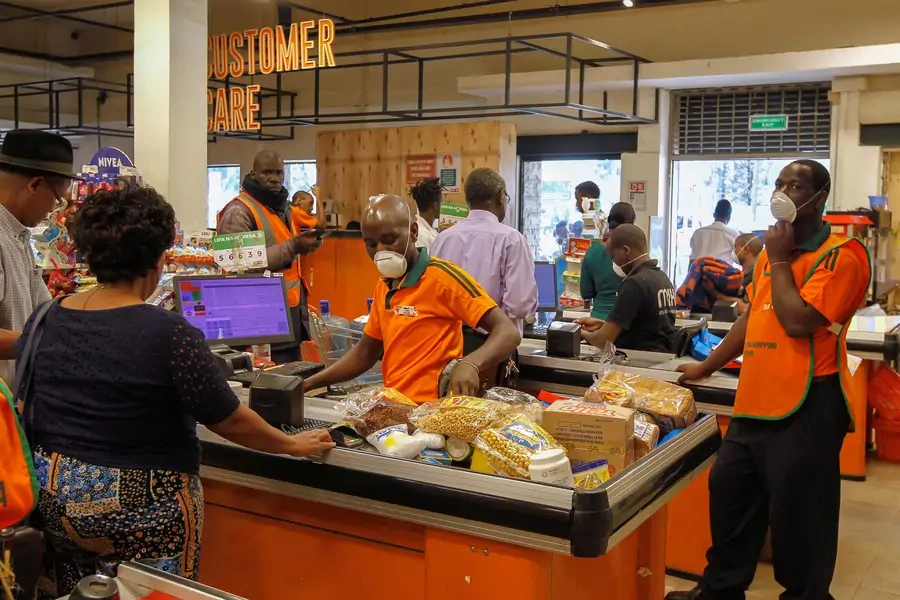 Customers shop for essential commodities inside the Naivas supermarket as residents stock their homes amid concerns about the spread of coronavirus disease (COVID-19) in Nairobi, Kenya March 23, 2020.