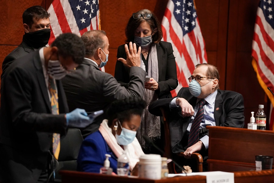 U.S. Rep. David Cicilline (D-RI) speaks to House Judiciary Committee Chairman Jerrold Nadler (D-NY) during a meeting of the House Judiciary Committee.