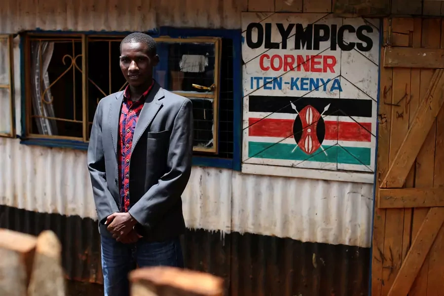 Kenyan runner Johana Kariankei, 24, poses by his shop which sells athletic souvenirs in Iten, western Kenya, on April 11, 2016.