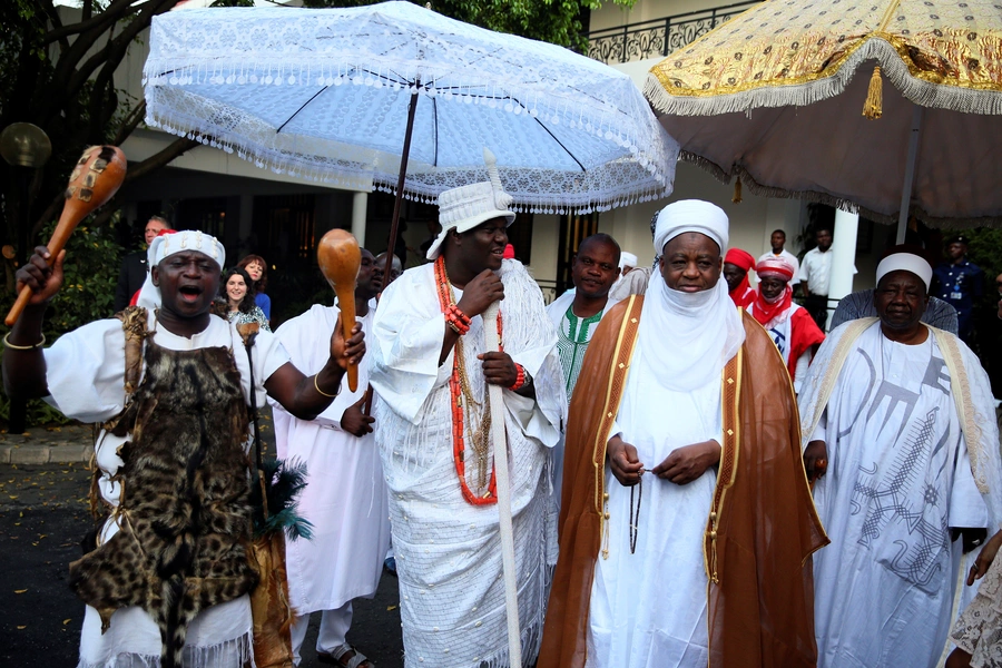 The Ooni of Ife, Adeyeye Ogunwusi, chats with the Sultan of Sokoto, Saad Abubakar, after their meeting with Britain's Prince Charles at the British High Commission residence in Abuja, Nigeria on November 6, 2018.