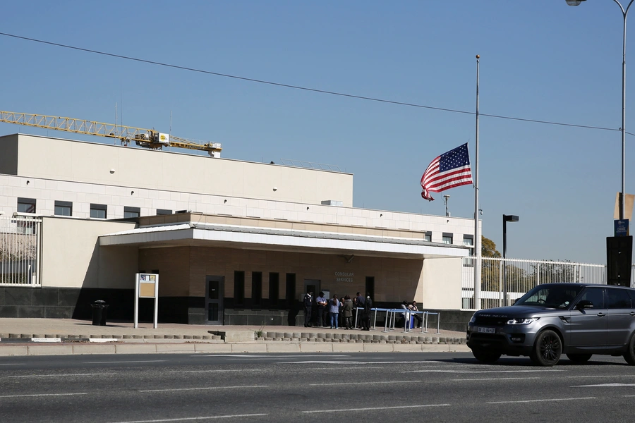 A car drives past the U.S. Embassy in Sandton, South Africa, on July 12, 2016.