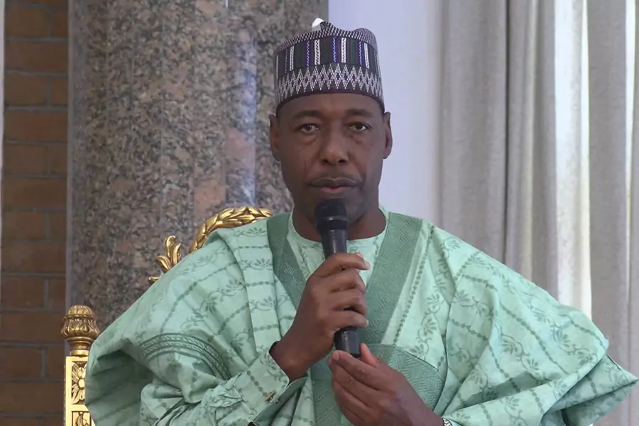 Babagana Umara Zulum, the governor of Borno state, addresses people at the shehu of Borno's palace in Maiduguri on February 12, 2020, to console with the people of the Auno community where over thirty lives were lost.