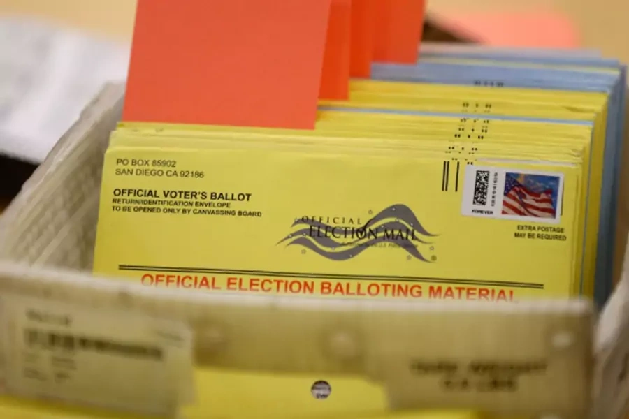 Mail-in ballots await verification at the San Diego County Elections Office during the 2016 election. 