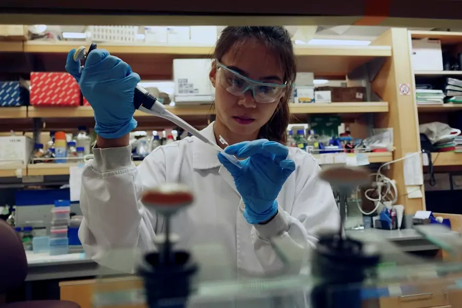 A researcher works in a lab at the Duke-NUS Medical School.