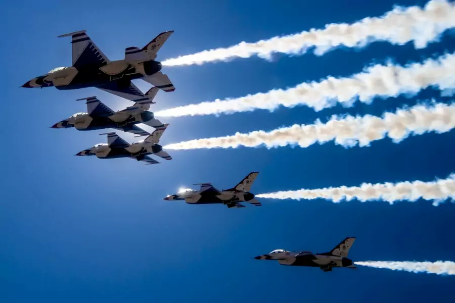 The USAF "Thunderbirds" fly over Las Vegas, Nevada, on April 11, 2020. USAF Staff Sgt. Cory W. Bush/Handout via REUTERS.