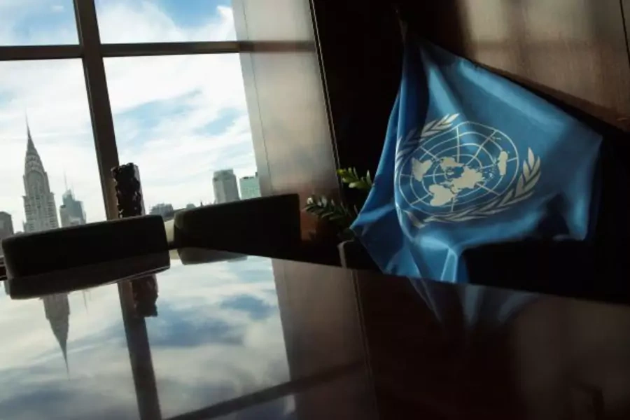 A United Nations flag is seen in a boardroom in the Secretariat building during the UN General Assembly at UN headquarters in New York on September 25, 2013. 