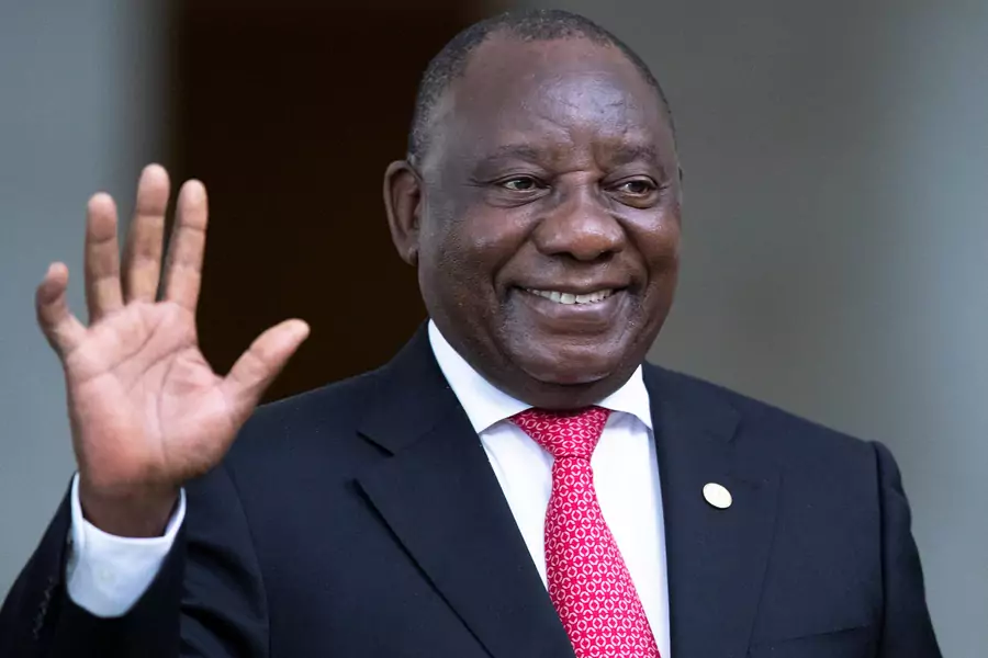 South Africa's President Cyril Ramaphosa greets the media prior to the BRICS summit in Brasilia, Brazil, on November 14, 2019. 
