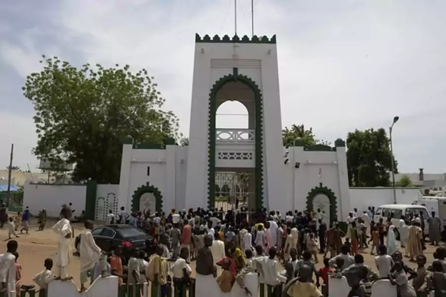 A crowd gathers in front of the Sultan Palace Hall Sokoto in Sokoto, Nigeria.