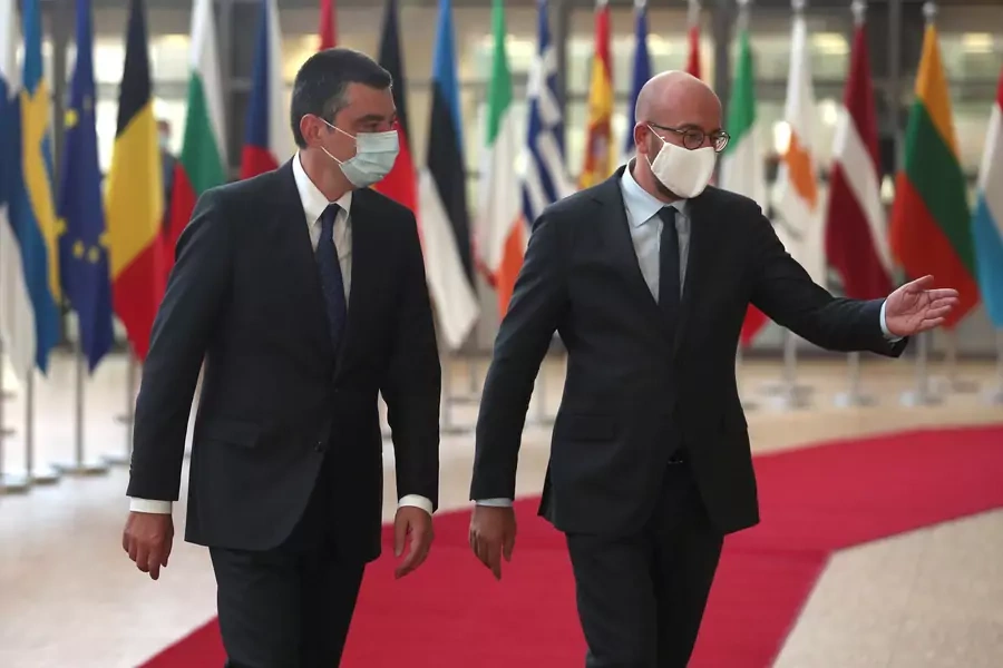 Georgia's Prime Minister Giorgi Gakharia is welcomed by European Council President Charles Michel.
