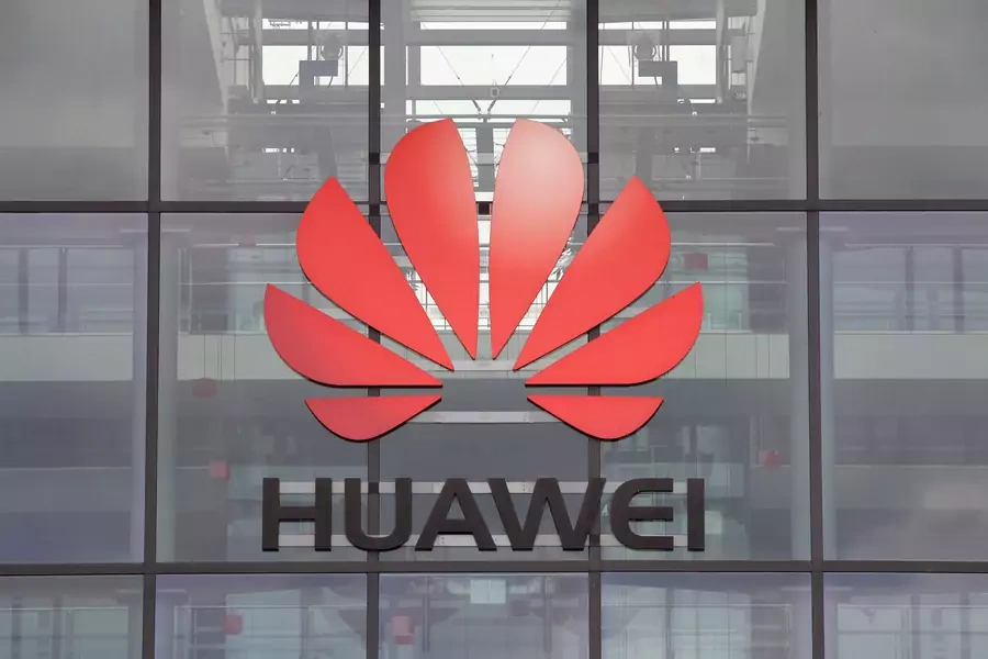 Huawei logo is pictured on the headquarters building in Reading.