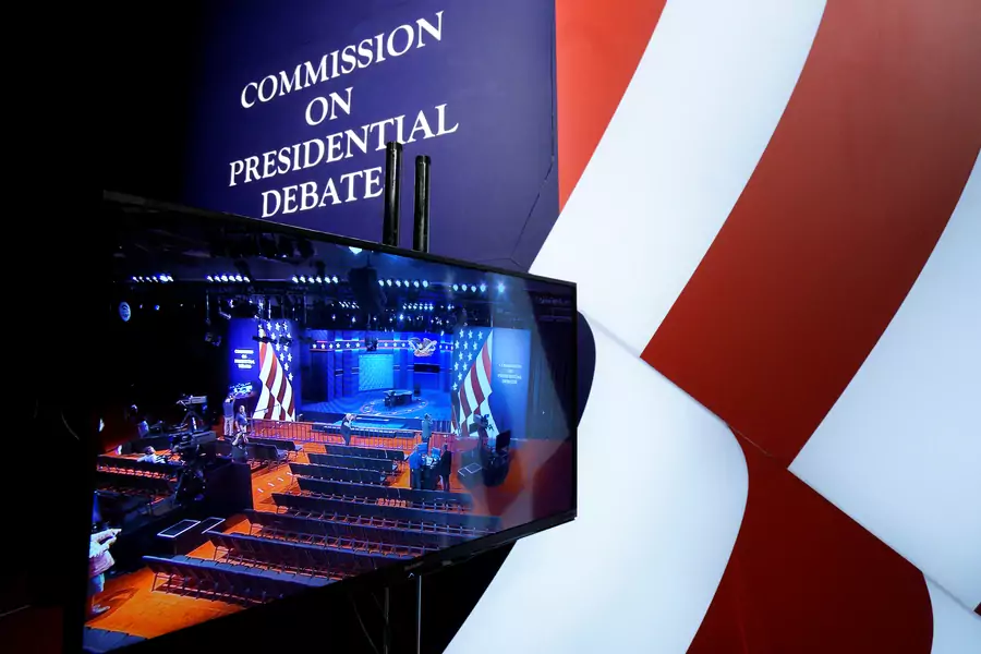 A television monitor shows the stage of the vice-presidential debate in 2016. Rick Wilking/Reuters