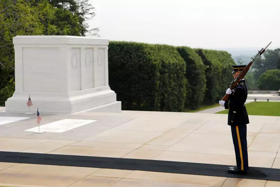 A member of the U.S. Army Honor Guard watches over the Tomb of the Unknown Soldier at Arlington National Cemetery. Jonathan Ernst/Reuters