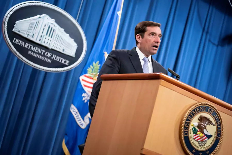 Assistant Attorney General for National Security John C. Demers speaks during a virtual news conference at the Department of Justice.