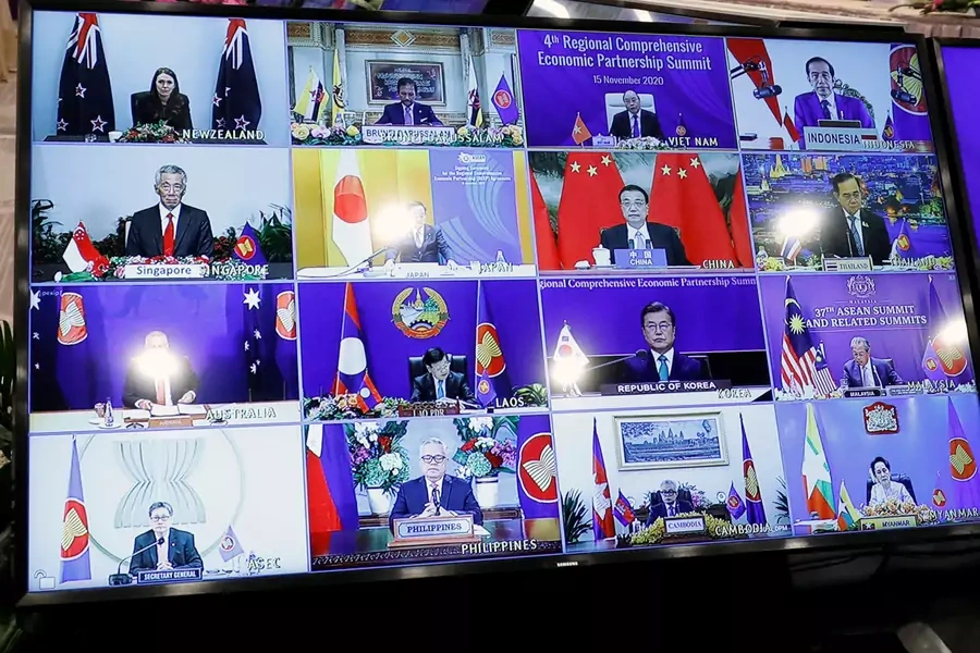 ASEAN leaders are seen on a screen as they attend the 4th Regional Comprehensive Economic Partnership Summit as part of the 37th ASEAN Summit in Hanoi, Vietnam on November 15, 2020.