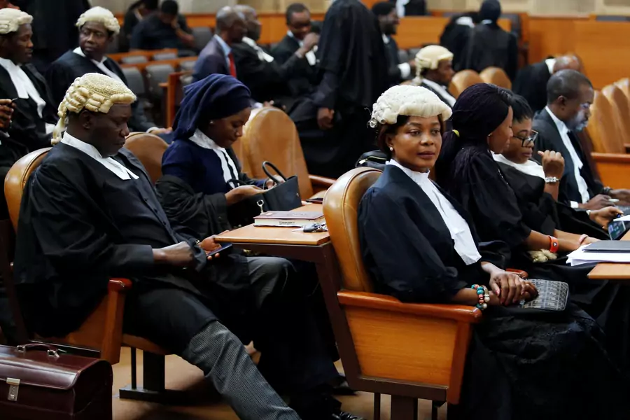 Lawyers are pictured ahead of a hearing to consider whether a tribunal has the authority to try the country's top judge, Walter Onnoghen, on charges of failing to disclose his assets, in Abuja, Nigeria on January 30, 2019.
