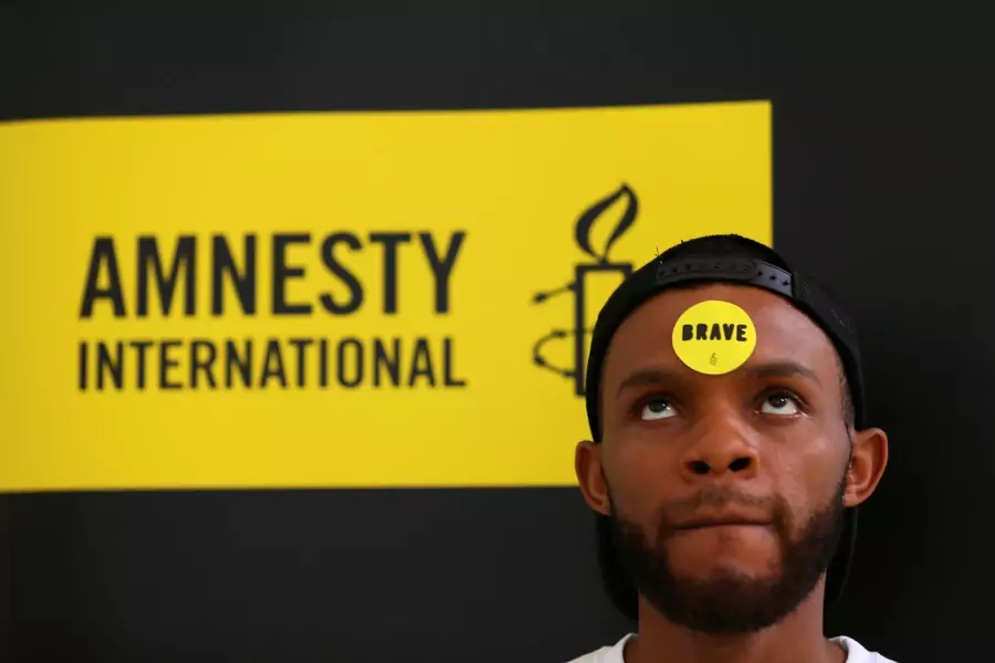 Human rights campaigner looks on during the release of an Amnesty International report in Abuja, Nigeria on May 16, 2017.