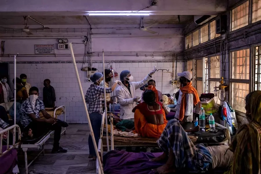 Medical staff treat a patient inside the emergency ward of Jawahar Lal Nehru Medical College and Hospital, during the COVID-19 outbreak, in Bhagalpur, Bihar in India on July 27, 2020. 