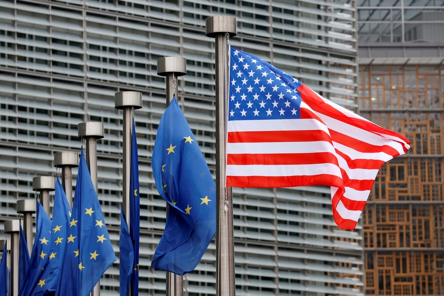 U.S. and European Union flags are pictured during the visit of Vice President Mike Pence to the European Commission headquarters in Brussels, Belgium February 20, 2017.