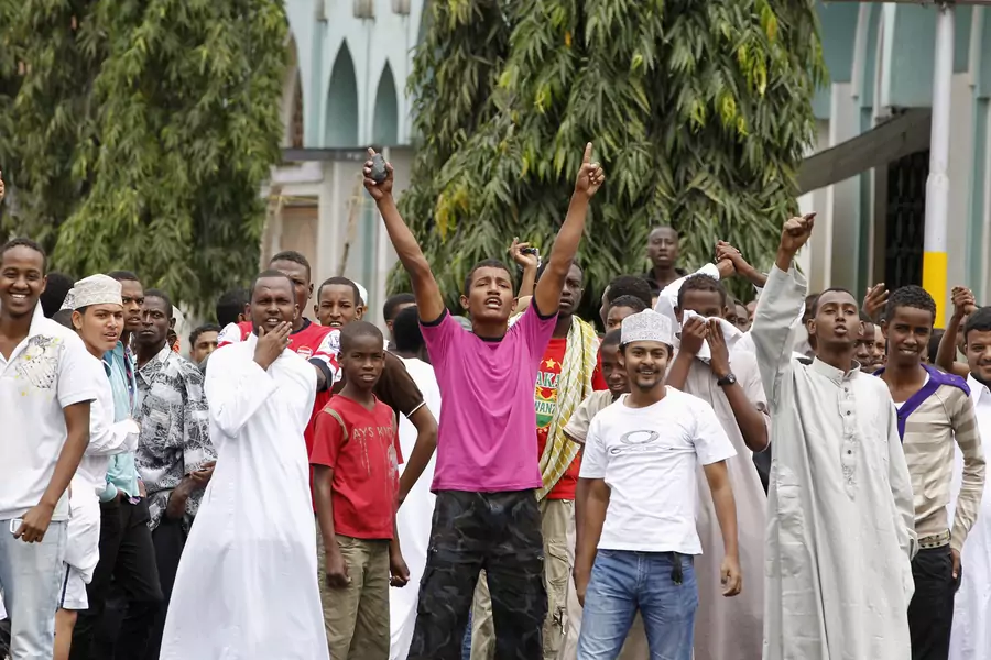 Muslim faithful chant slogans during a protest against the August 27 killing of Sheikh Aboud Rogo Mohammed, after Friday prayers at the Masjid Musa Mosque in the Kenyan coastal city of Mombasa, on August 31, 2012.