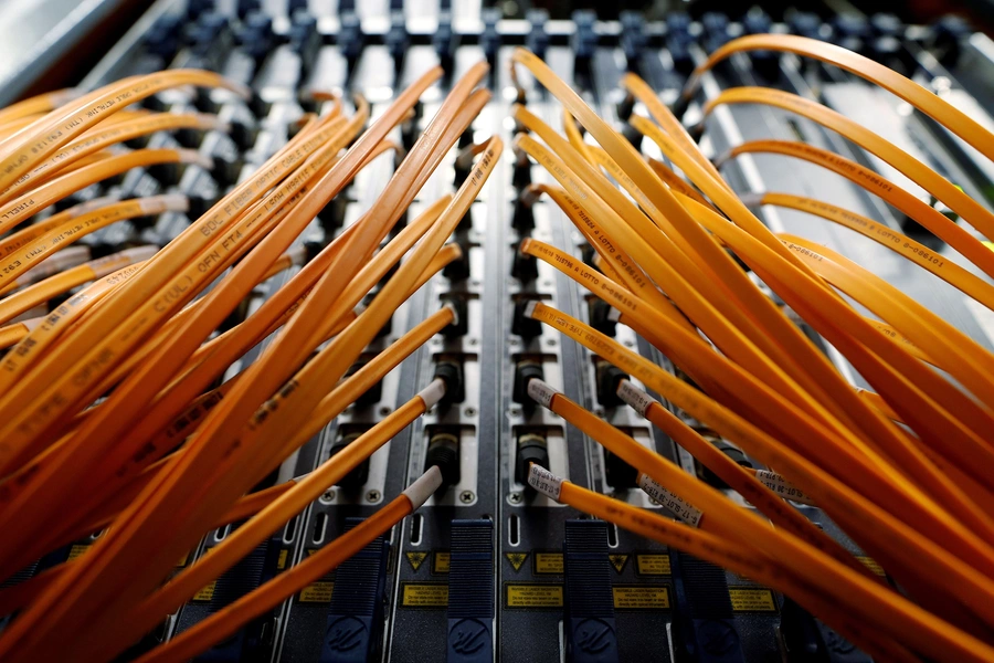 Optical fibre cables are seen in a telephone exchange.