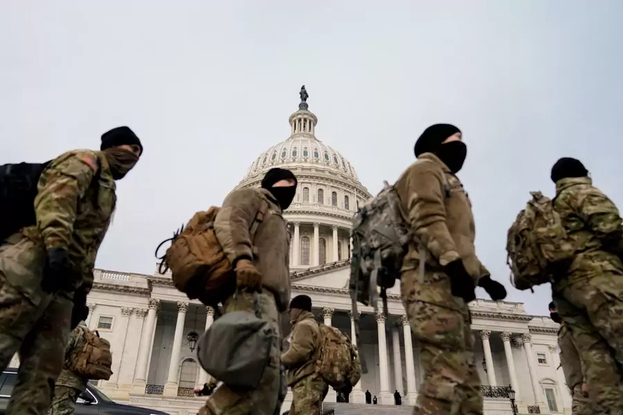 Members of the National Guard arrive to the U.S. Capitol.