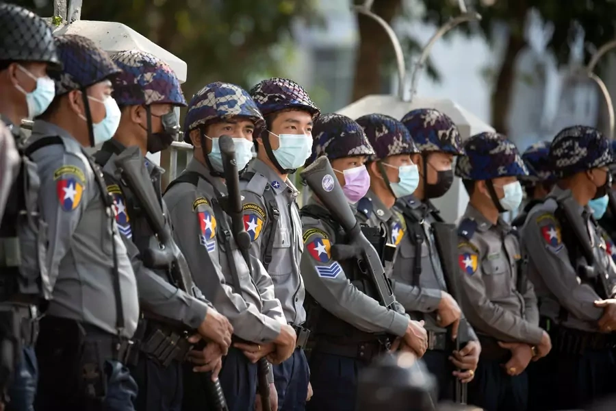 Police stand guard as they wait for protests against coup in Yangon, Myanmar, on February 4, 2021.