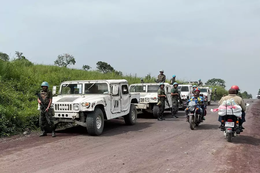 UN peacekeepers secure the scene where the Italian ambassador to the Democratic Republic of Congo, Luca Attanasio, and two others were killed in an attempted kidnapping when their convoy was attacked in Ruhimba village, eastern DRC, on February 22, 2021.