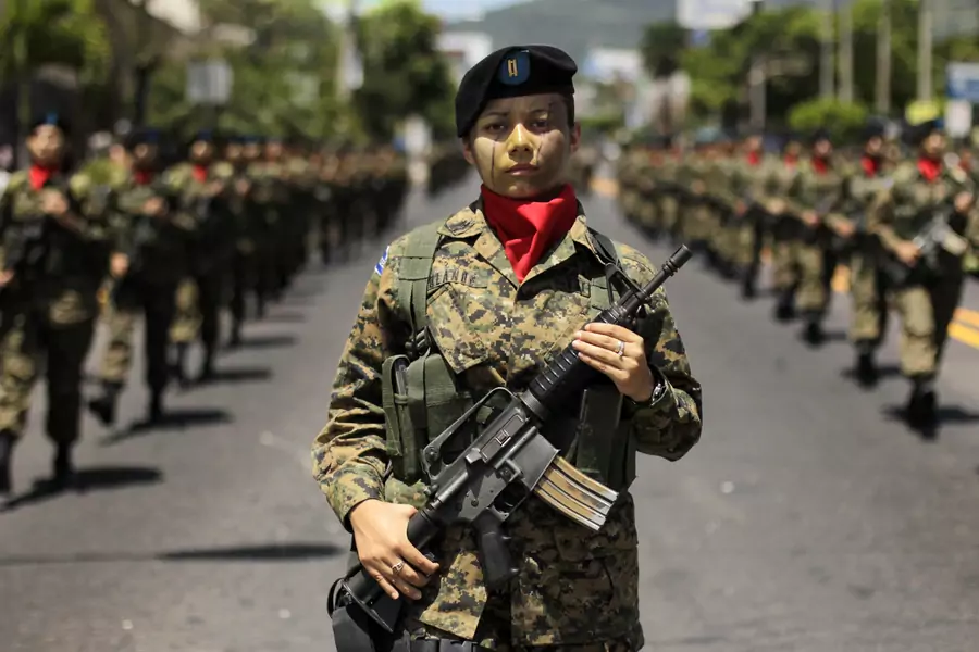 Special forces soldiers with painted faces march on the main streets during the parade commemorating Independence Day in San Salvador September 15, 2012.