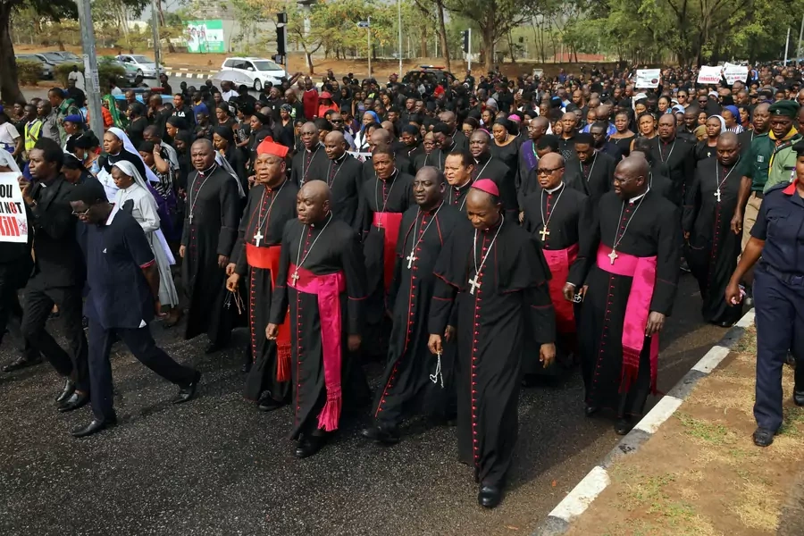 Catholic faithfuls, led by bishops, march during a protest over unending killings of Nigerians in Abuja, Nigeria on March 1, 2020.