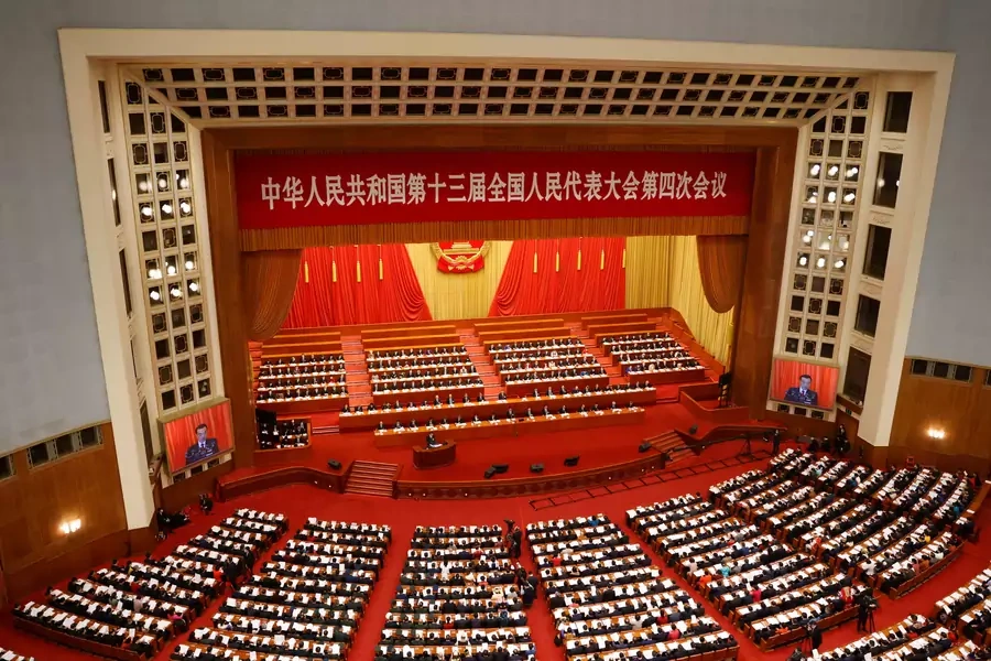 Chinese Premier Li Keqiang speaks at the opening session of the National People's Congress (NPC) at the Great Hall of the People in Beijing, China March 5, 2021.