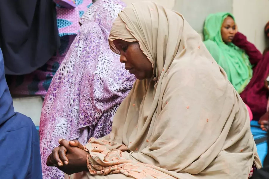 Women mourn the death of aid workers who were executed by Islamist militants, in the northeast Nigerian city of Maiduguri, Nigeria on July 23, 2020.