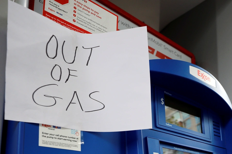 A sign is seen as Exxon station is out of gas after a cyberattack crippled the biggest fuel pipeline in the country, run by Colonial Pipeline, in Washington on May 15, 2021.