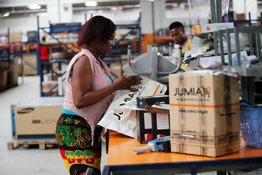 A woman works at a warehouse for Jumia, an e-commerce company, in Lagos, Nigeria.