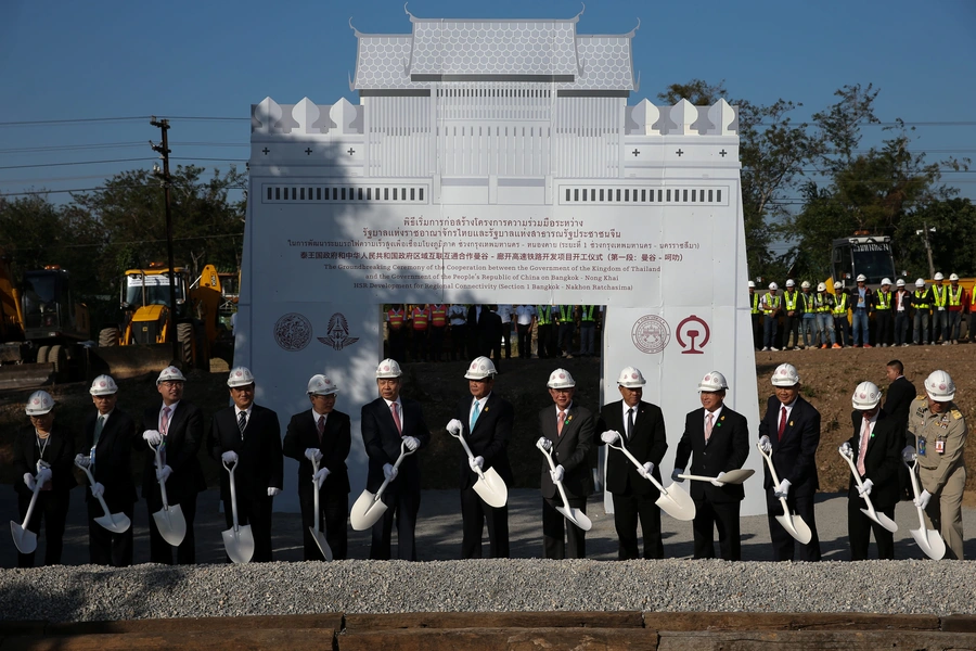 Thailand's Prime Minister Prayuth Chan-ocha (C) and Wang Xiaotao (C-L) take part during the groundbreaking ceremony on the Bangkok-Nong Khai high speed rail development in Nakhon Ratchasima Province, Thailand, on December 21, 2017.