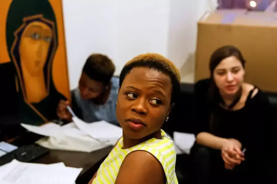 After being rescued from human traffickers, a Nigerian woman attends a Russian language course in Moscow.