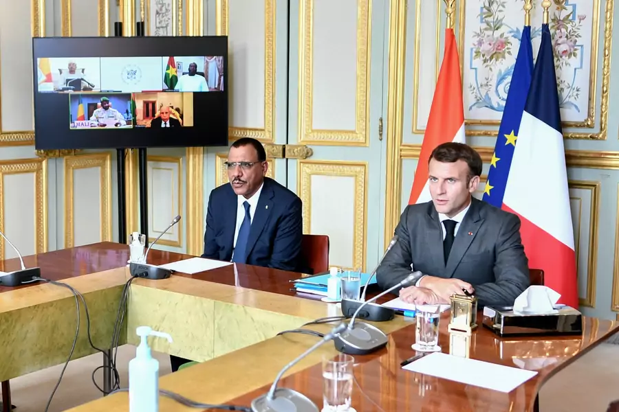 French President Emmanuel Macron and Niger's President Mohamed Bazoum attend a video summit with leaders of G5 Sahel countries after France's decision to reduce its troop presence in West Africa, at the Elysee presidential Palace in Paris on July 9, 2021.