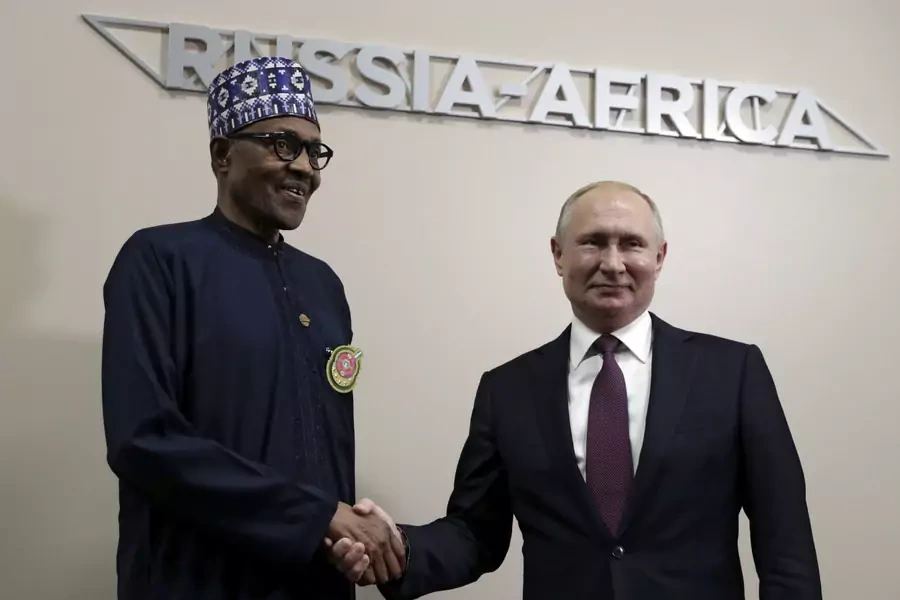 Russia's President Vladimir Putin shakes hands with Nigeria's President Muhammadu Buhari during a meeting on the sidelines of the Russia–Africa Summit in Sochi, Russia on October 23, 2019.