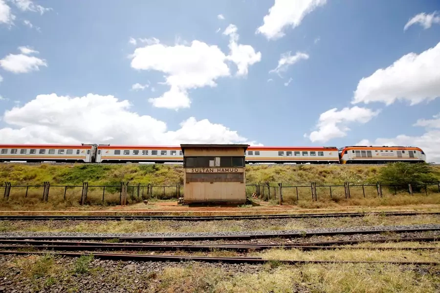 An SGR passenger train travels past the town of Sultan Hamud, Kenya on February 13, 2019. 