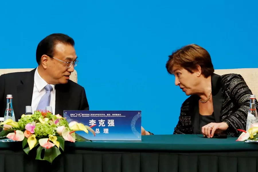 IMF Managing Director Kristalina Georgieva talks to Chinese Premier Li Keqiang before a news conference following the "1+6" Roundtable meeting at the Diaoyutai state guesthouse in Beijing, China November 21, 2019.