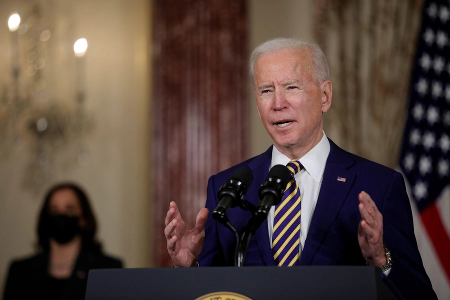 U.S. President Joe Biden delivers a foreign policy address as Vice President Kamala Harris listens during a visit to the State Department in Washington, DC, on February 4, 2021. 