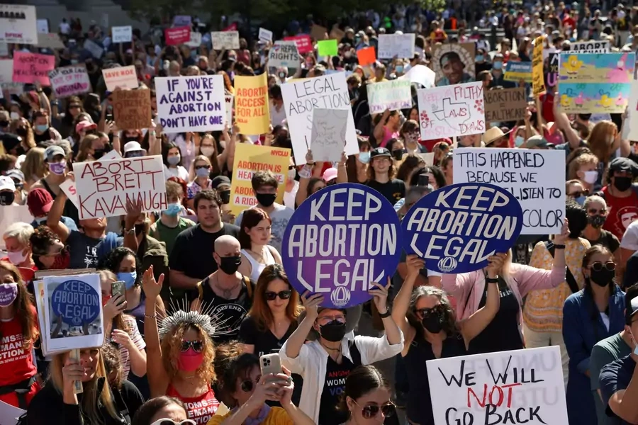 People protest the restrictive Texas abortion law in New York City during the 2021 Women's March.