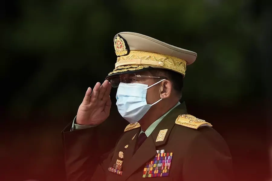 Myanmar's Army Chief Min Aung Hlaing salutes during the Martyrs' Day ceremony in Yangon on July 19, 2020.