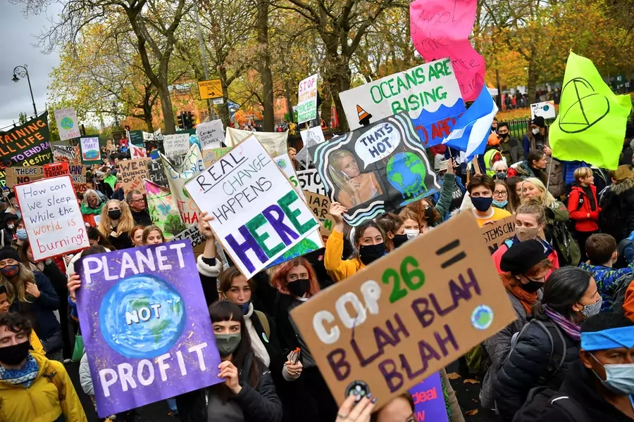 Demonstrators participate in the Fridays for the Future march on November 5, 2021, in Glasgow, Scotland.