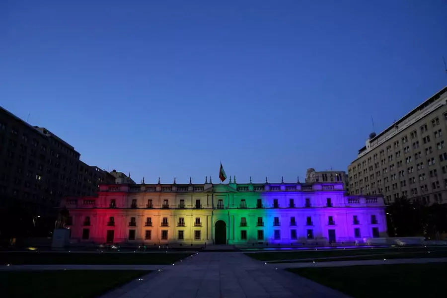 Chile's government palace is illuminated with the LGBT flag colours after the Senate approved a same-sex marriage bill in Santiago, Chile, December 7, 2021. 