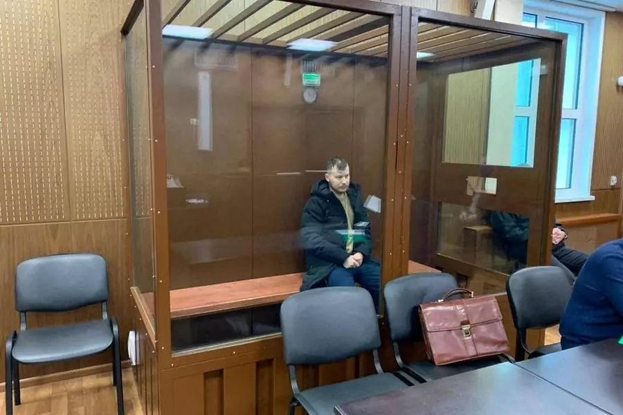 Ruslan Khansvyarov, one of the suspected members of REvil detained by the FSB earlier this week, sits in court in Moscow.