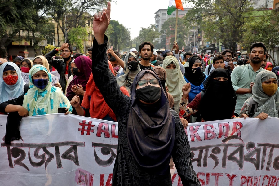 DOCUMENT DATE: February 09, 2022 A Muslim student shouts slogans as she takes part in a protest against the recent hijab ban in few colleges of Karnataka state, in Kolkata, India, February 9, 2022.