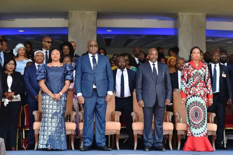 Democratic Republic of Congo's outgoing President Joseph Kabila and his successor Felix Tshisekedi stand during an inauguration ceremony where Tshisekedi will be sworn into office at the Palais de la Nation in Kinshasa, DRC on January 24, 2019.