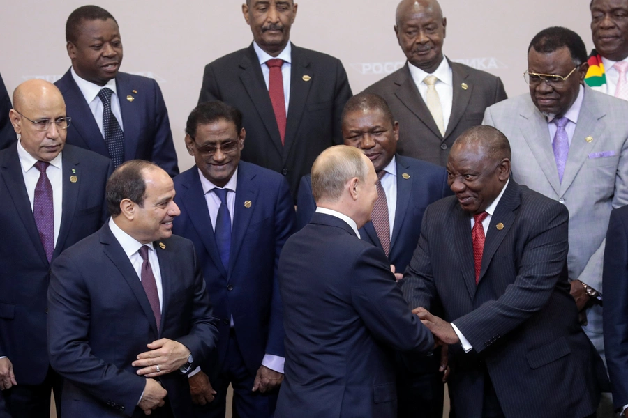 Russian President Vladimir Putin shakes hands with South African President Cyril Ramaphosa in the 2019 Russia-Africa Summit at Sochi, Russia, on October 24, 2019.